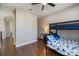 Bedroom with a bunk bed, hardwood floors, and neutral paint at 2322 Bayshore Rd, Nokomis, FL 34275