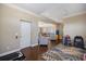 Spacious bonus room featuring hardwood floors and staircase at 2322 Bayshore Rd, Nokomis, FL 34275