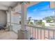 Covered porch with white pillars offers neighborhood views at 2322 Bayshore Rd, Nokomis, FL 34275