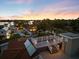 View from rooftop deck overlooks the neighborhood and peaceful water bay at 2322 Bayshore Rd, Nokomis, FL 34275
