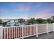 Enjoy serene views from this rooftop deck overlooking the neighborhood and bay at 2322 Bayshore Rd, Nokomis, FL 34275