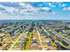 Panoramic aerial shot demonstrating the neighborhood's proximity to water and golf courses, highlighting the property at 269 Mark Twain Ln, Rotonda West, FL 33947