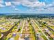 Extended aerial perspective showing the community layout, waterways, and the property's location at 269 Mark Twain Ln, Rotonda West, FL 33947