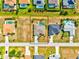 Aerial view of the property within the neighborhood, showcasing its location and surrounding homes at 269 Mark Twain Ln, Rotonda West, FL 33947