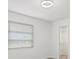 Empty bedroom features neutral paint, a window, and a walk-in closet at 269 Mark Twain Ln, Rotonda West, FL 33947