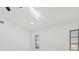 Bedroom features a skylight and windows at 269 Mark Twain Ln, Rotonda West, FL 33947