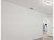Empty bedroom features neutral paint and wood-look floors at 269 Mark Twain Ln, Rotonda West, FL 33947