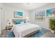 Bedroom featuring beach themed decor, and blue accent rug at 269 Mark Twain Ln, Rotonda West, FL 33947