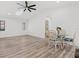 Bright dining room features a skylight and tile floors at 269 Mark Twain Ln, Rotonda West, FL 33947