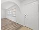 Bright entryway featuring fresh paint, luxury vinyl plank flooring, and natural light at 269 Mark Twain Ln, Rotonda West, FL 33947