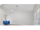 Spacious open-concept living area featuring fresh paint, modern fixtures, and natural light at 269 Mark Twain Ln, Rotonda West, FL 33947