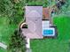 Birds eye view of home with pool and large yard with mature trees at 27215 Crosby Rd, Myakka City, FL 34251