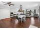 Spacious living room offers an open floor plan with a dining area and cozy seating at 27215 Crosby Rd, Myakka City, FL 34251