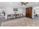 Multi-purpose room with study space, cabinet and large rug at 27215 Crosby Rd, Myakka City, FL 34251