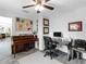 Office featuring a piano, desk, and comfortable chair at 27215 Crosby Rd, Myakka City, FL 34251