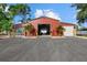 Open garage with a car inside and plenty of room for parking and storage at 2769 Dode Ave, North Port, FL 34288