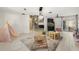 Spacious playroom featuring a variety of toys, hard surface floors and view to main living areas at 2769 Dode Ave, North Port, FL 34288