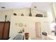 Bright living room featuring decor and ample natural light at 320 Clearbrook Cir # 203, Venice, FL 34292