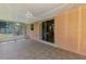 Covered lanai with tile flooring, a ceiling fan, and an adjacent enclosed sunroom at 331 Bucknell Rd, Venice, FL 34293