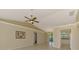 Spacious living room with tile flooring, neutral paint, and an open design for flexible living at 331 Bucknell Rd, Venice, FL 34293