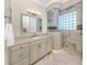 Elegant bathroom featuring a vanity with a single sink and a glass-enclosed shower at 333 Sunrise Dr, Nokomis, FL 34275