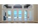 View from living room out to the patio, featuring a water view at 333 Sunrise Dr, Nokomis, FL 34275