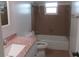 Modest bathroom features tiled shower/tub combo, granite countertop, and large mirror at 334 Dante Dr # 334, Nokomis, FL 34275