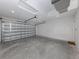 Garage with epoxy flooring and an automatic garage door at 3588 Erie Ct, North Port, FL 34287