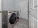 Laundry room with new washer and dryer at 3588 Erie Ct, North Port, FL 34287