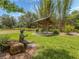 Beautiful park features a covered pavilion, a statue, lush grass and bamboo, perfect for relaxation and enjoying nature at 3588 Erie Ct, North Port, FL 34287