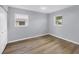 Bright bedroom features new floors, freshly painted walls, and ample natural light at 3616 Lalani Blvd, Sarasota, FL 34232