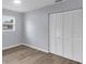 Clean and bright bedroom features new floors, a closet and natural lighting at 3616 Lalani Blvd, Sarasota, FL 34232