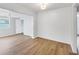 Bright and airy living room with new floors and freshly painted walls at 3616 Lalani Blvd, Sarasota, FL 34232