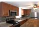 Beautiful kitchen with stainless appliances, granite counters, and ample storage at 373 Longwood Dr, Venice, FL 34285