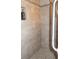 Tiled shower featuring grab bars and plenty of places to store all of your toiletries at 373 Longwood Dr, Venice, FL 34285
