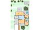 A colorful floor plan showing the layout of the house, including the bedrooms, bathrooms, kitchen, living room, and backyard at 413 Valencia Rd, Venice, FL 34285