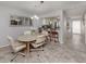 Open-concept dining area adjacent to the kitchen, ideal for entertaining and gatherings at 418 Cerromar Ct # 158, Venice, FL 34293