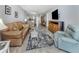 Spacious living room boasts comfortable seating, neutral decor, and an open floor plan at 418 Cerromar Ct # 158, Venice, FL 34293