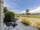 Relaxing patio space with comfortable seating, surrounded by a beautifully landscaped yard and scenic views at 418 Cerromar Ct # 158, Venice, FL 34293