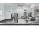 Bright kitchen featuring stainless steel appliances, mosaic backsplash, and ample counter space at 4378 Summertree Rd, Venice, FL 34293