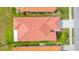 Aerial rooftop view showcasing the red tile roof, well-maintained landscaping, and surrounding neighborhood at 4378 Summertree Rd, Venice, FL 34293