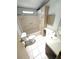 Bathroom featuring a shower-tub combo, toilet, and a vanity with sink at 453 Sharks Pt, North Port, FL 34287