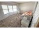 Bedroom featuring a daybed, small nightstands, and lots of natural light at 453 Sharks Pt, North Port, FL 34287
