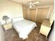 Bedroom featuring a bed, closets, dresser, and neutral carpeting at 453 Sharks Pt, North Port, FL 34287
