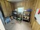 Unfinished garage space with storage shelves, pegboard and window for added light at 453 Sharks Pt, North Port, FL 34287