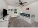 Bright bedroom with a trundle bed and plenty of storage with carpet floors and neutral paint at 460 Bard Rd, Venice, FL 34293