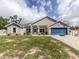 Charming single Gathering home with a two car garage and a well manicured lawn at 460 Bard Rd, Venice, FL 34293