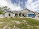Charming single Gathering home with a two car garage and a well manicured lawn at 460 Bard Rd, Venice, FL 34293