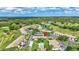Picturesque community with a golf course, lake, and convenient access to nearby amenities at 4646 Longwater Chase # 98, Sarasota, FL 34235