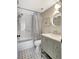 Updated bathroom with shower and tub combo, modern vanity, and neutral finishes at 4646 Longwater Chase # 98, Sarasota, FL 34235